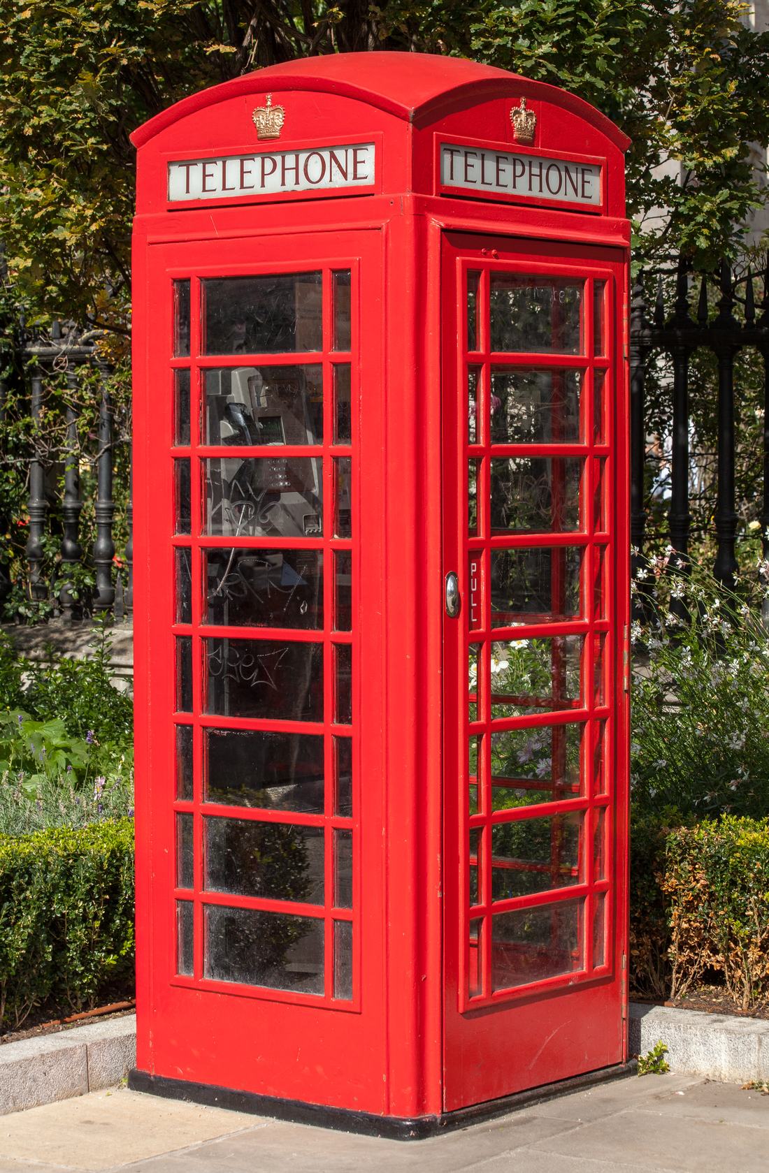 A red telephone box near St Paul's Cathedral in London